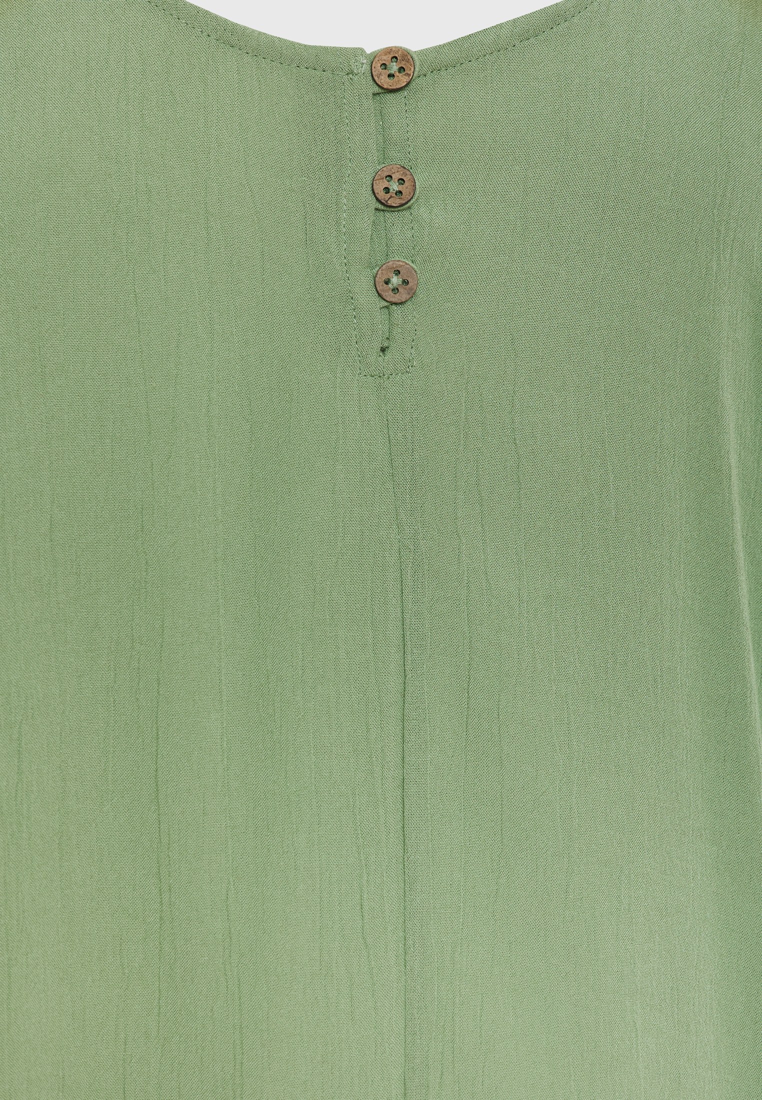 Γυναικείο shell top από βισκόζη φωτογραφία