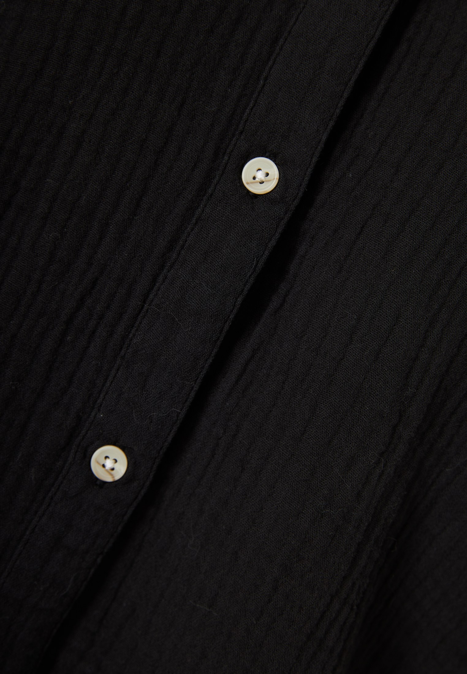 Γυναικείο βαμβακερό πουκάμισο φωτογραφία