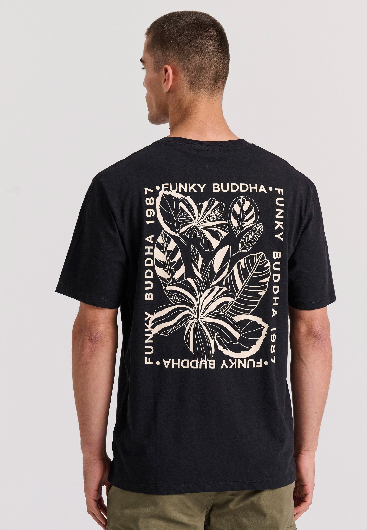 Relaxed fit t-shirt με tropical τύπωμα στην πλάτη φωτογραφία