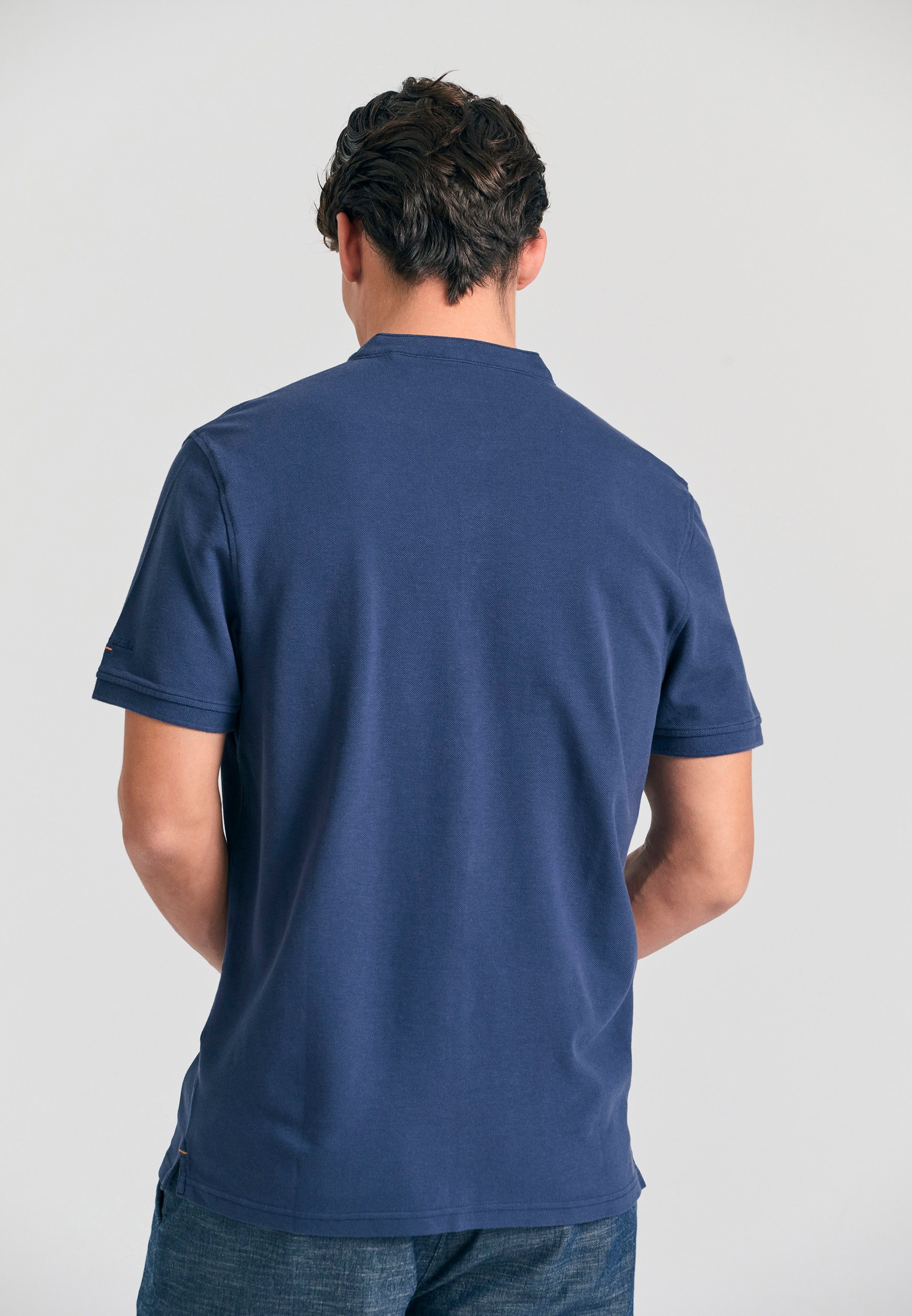 Πλεκτή polo μπλούζα σε μελανζέ πλέξη