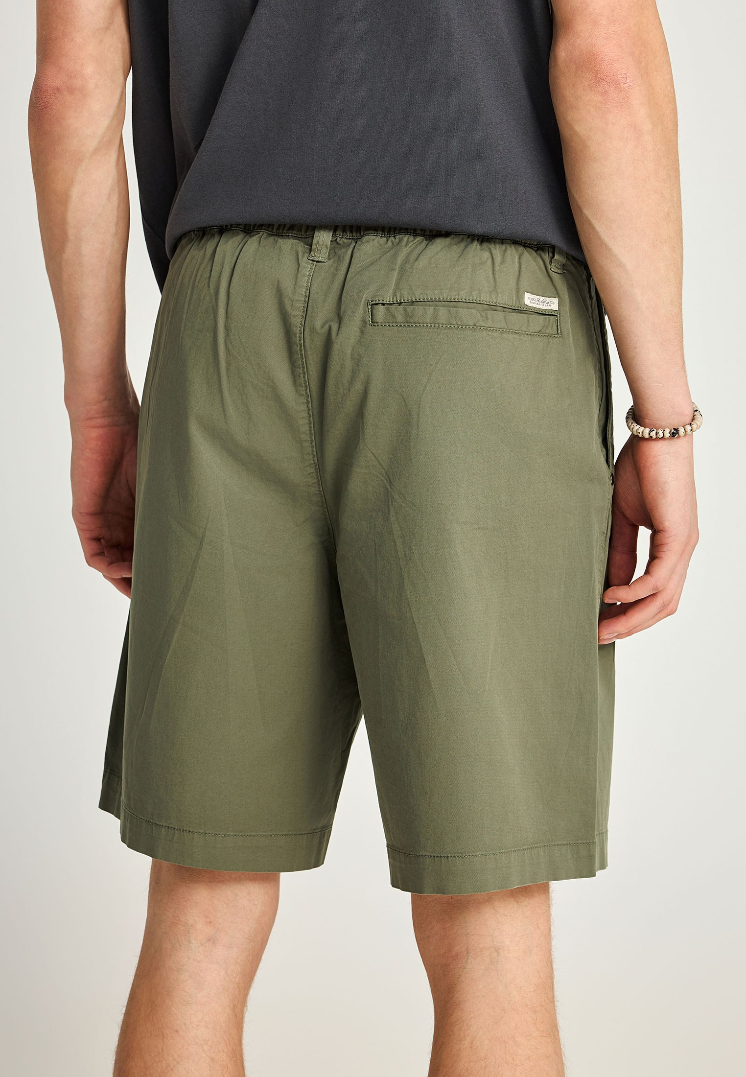 Ανδρική chino βερμούδα φωτογραφία