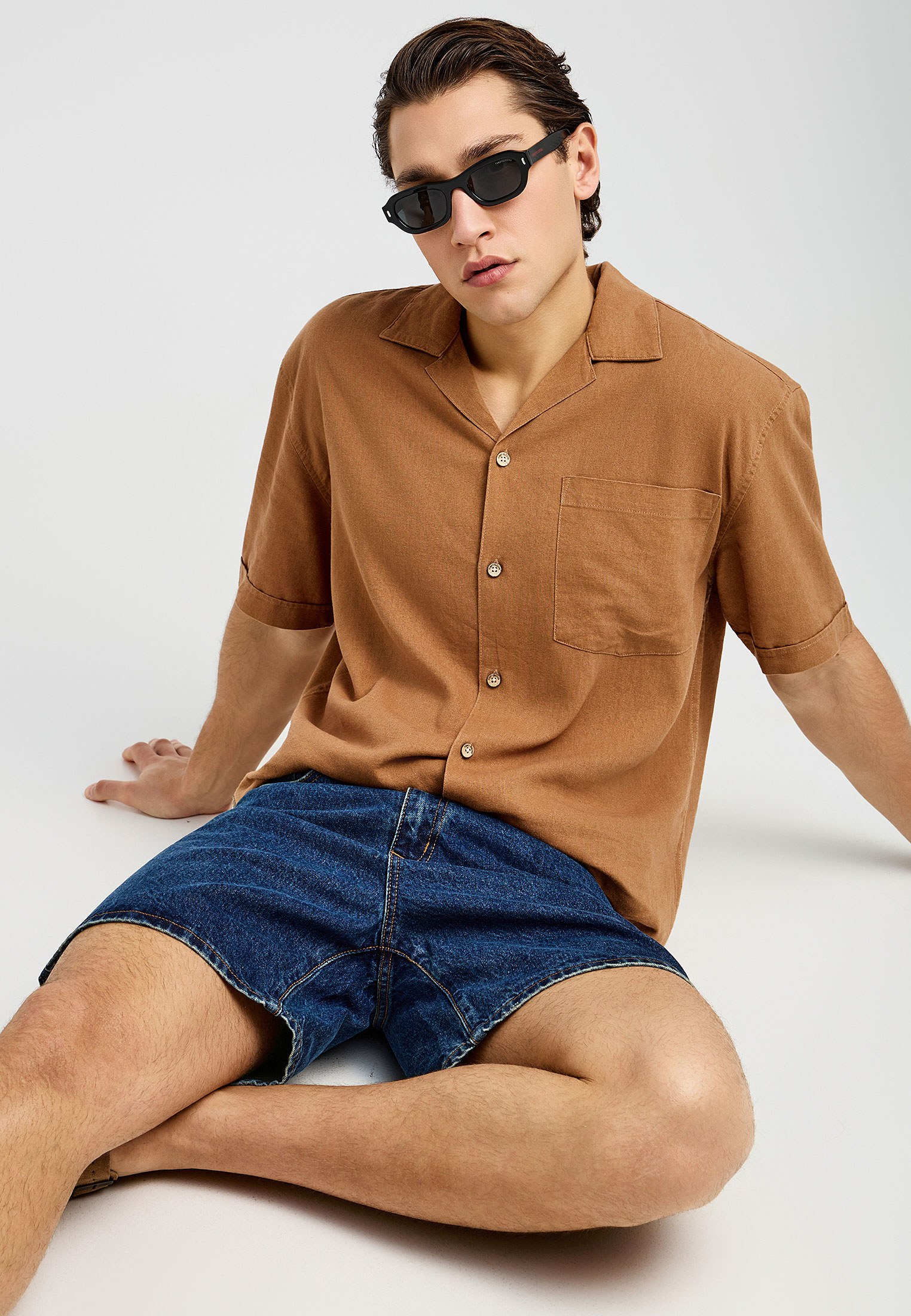 Ανδρική baggy βερμούδα τζην με washed effects