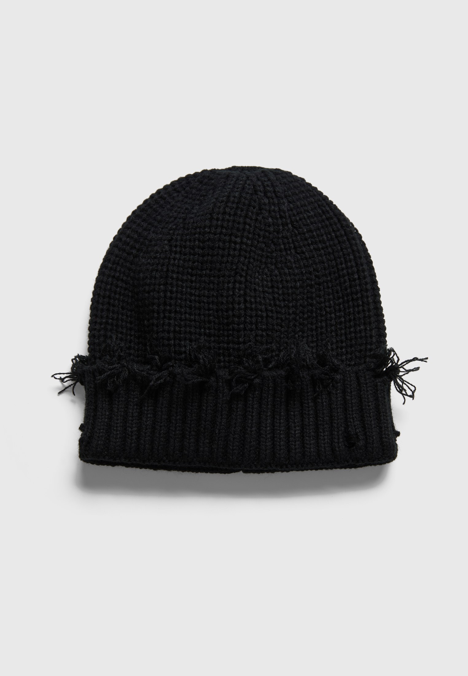 Πλεκτός σκούφος beanie με ξέφτια στο ρεβέρ