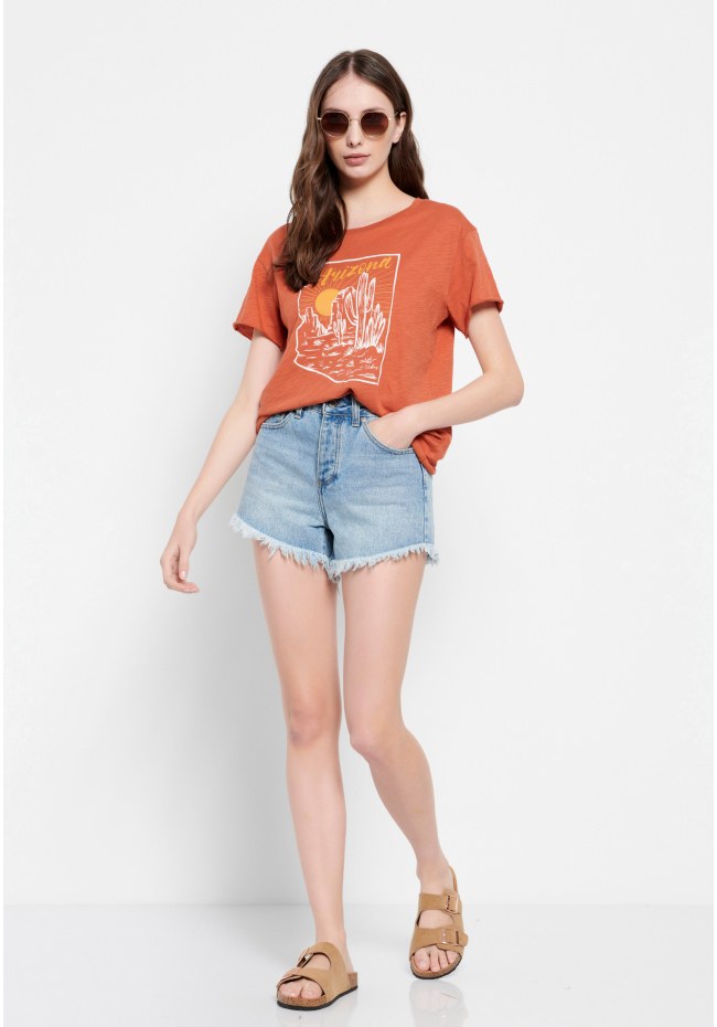 High-rise denim shorts with destroyed effects