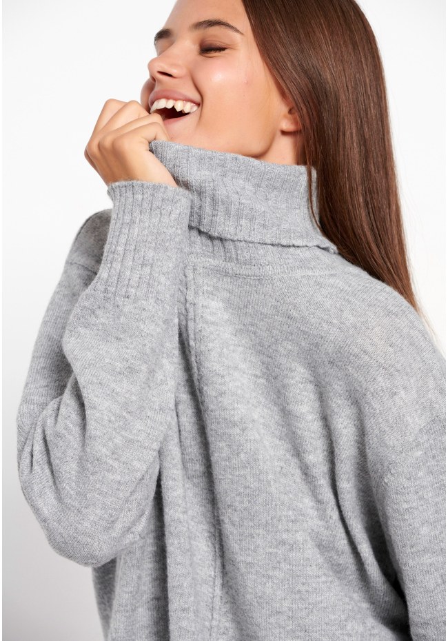 Turtle neck oversized sweater with side slits