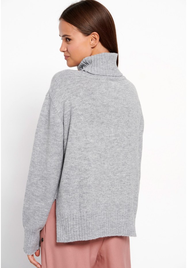Turtle neck oversized sweater with side slits