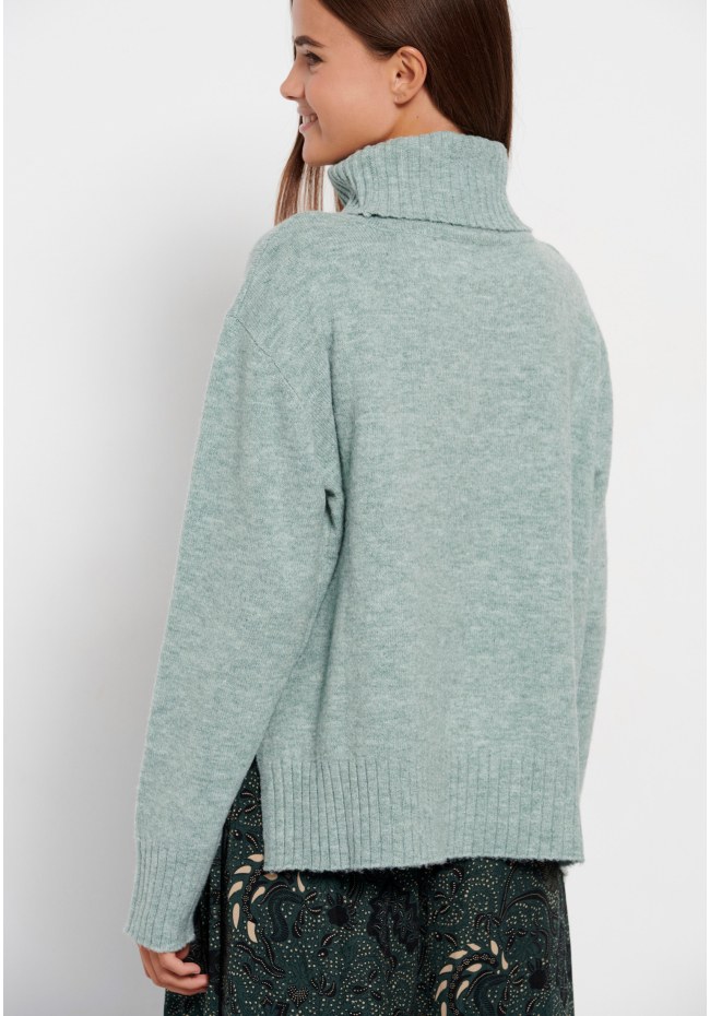 Turtle neck oversized sweater with side slits