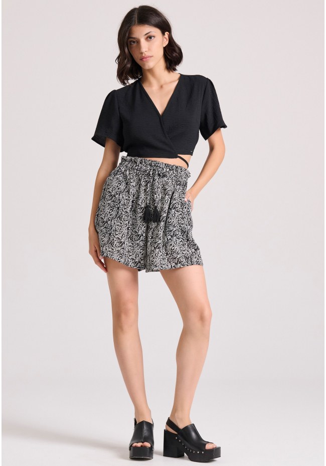 Loose fit εμπριμέ σορτς με βολάν