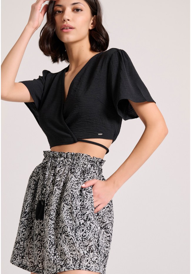 Loose fit εμπριμέ σορτς με βολάν