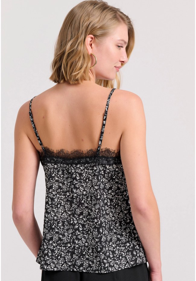 Εμπριμέ τοπ με λεπτομέρειες δανδέλας