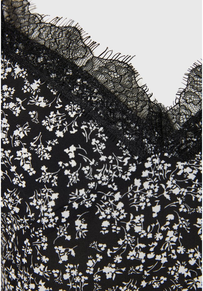 Εμπριμέ τοπ με λεπτομέρειες δανδέλας