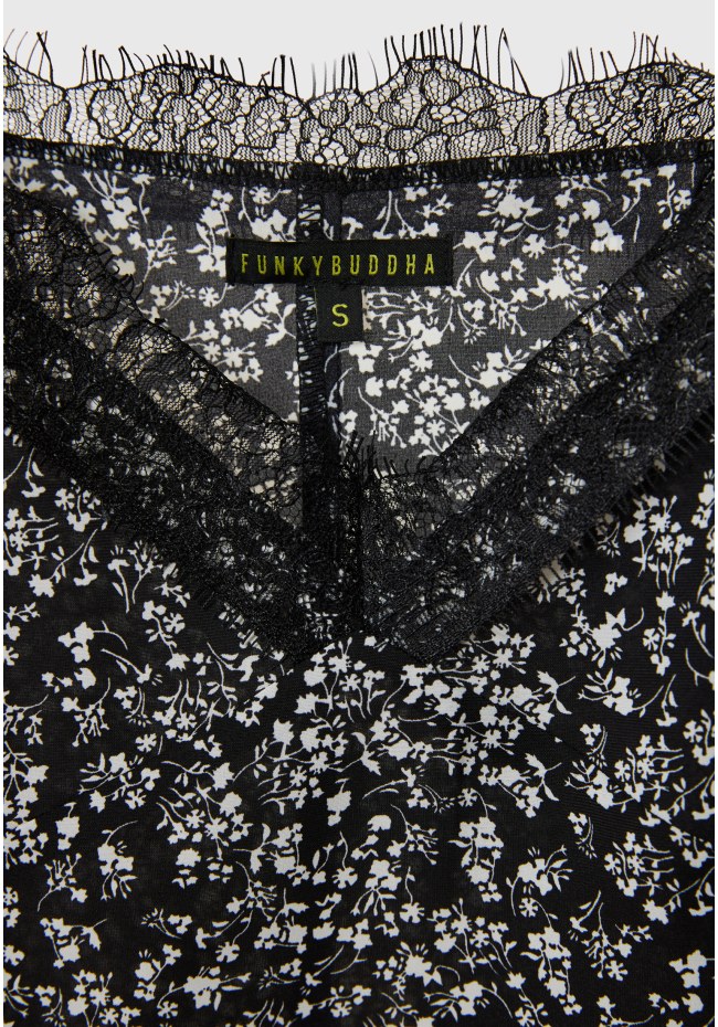 Εμπριμέ τοπ με λεπτομέρειες δανδέλας