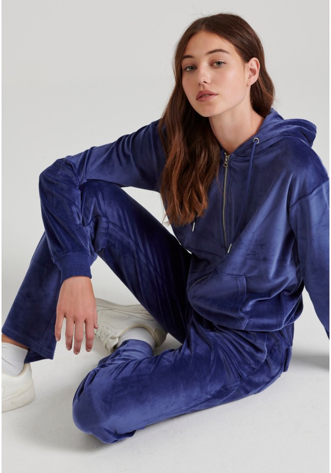Women's flare fit joggers in velour fabric