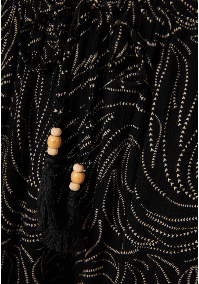 Loose fit εμπριμέ παντελόνα σε boho look