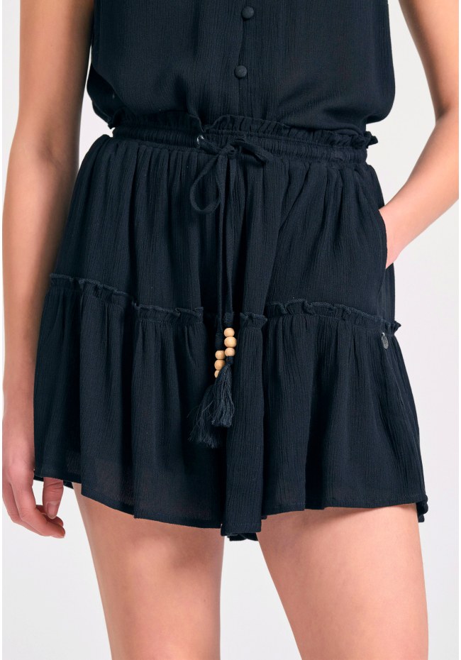 Loose fit skort με βολάν και κέντημα