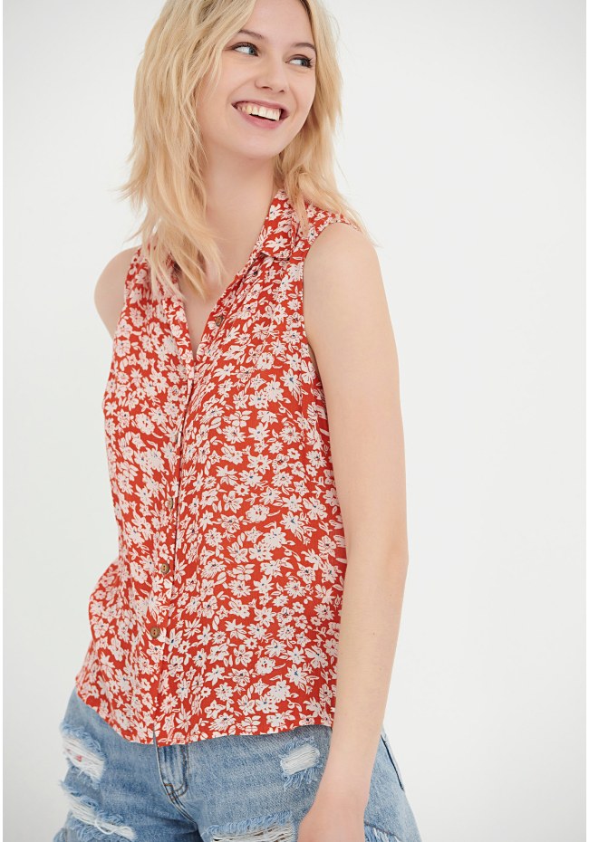 Sleeveless all over printed floral shirt