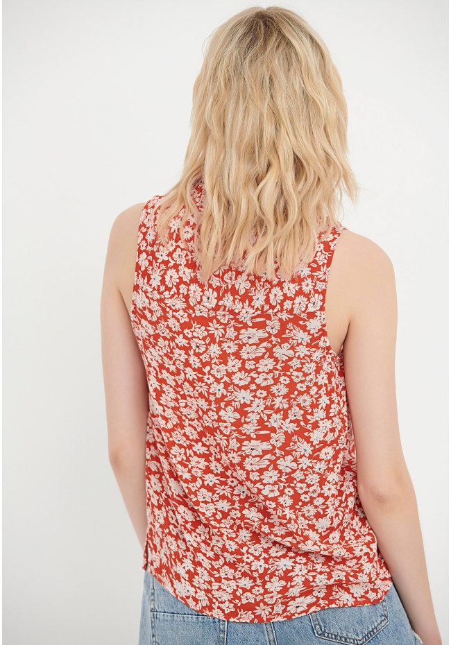 Sleeveless all over printed floral shirt