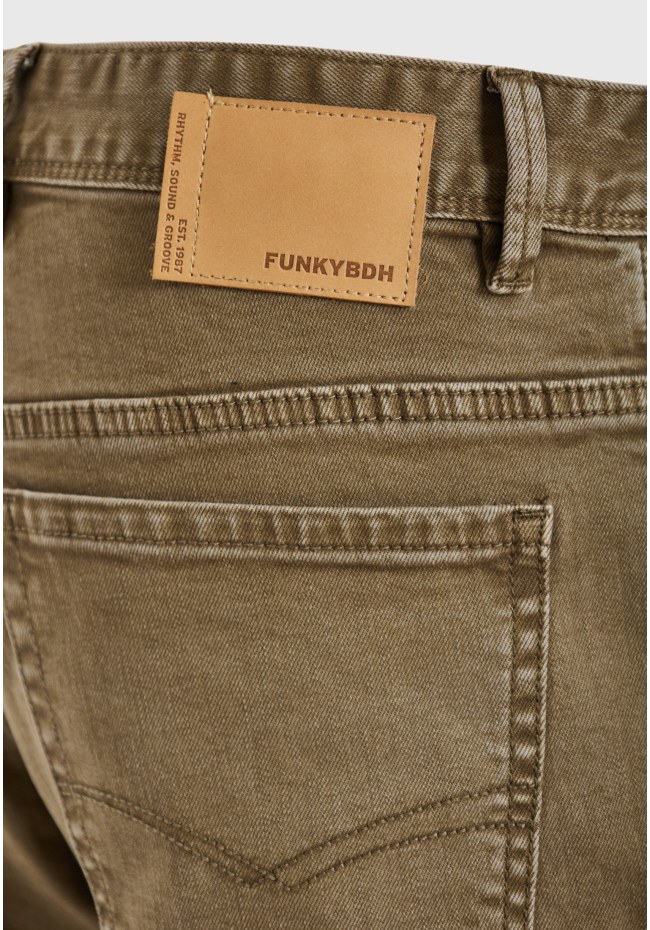 Relaxed tapered fit garment dyed jeans