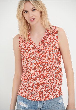 Sleeveless all over printed floral shirt