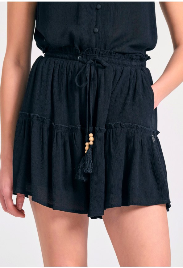 Loose fit skort με βολάν και κέντημα