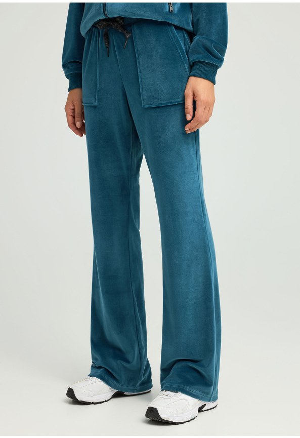 Women's flare fit joggers in velour fabric