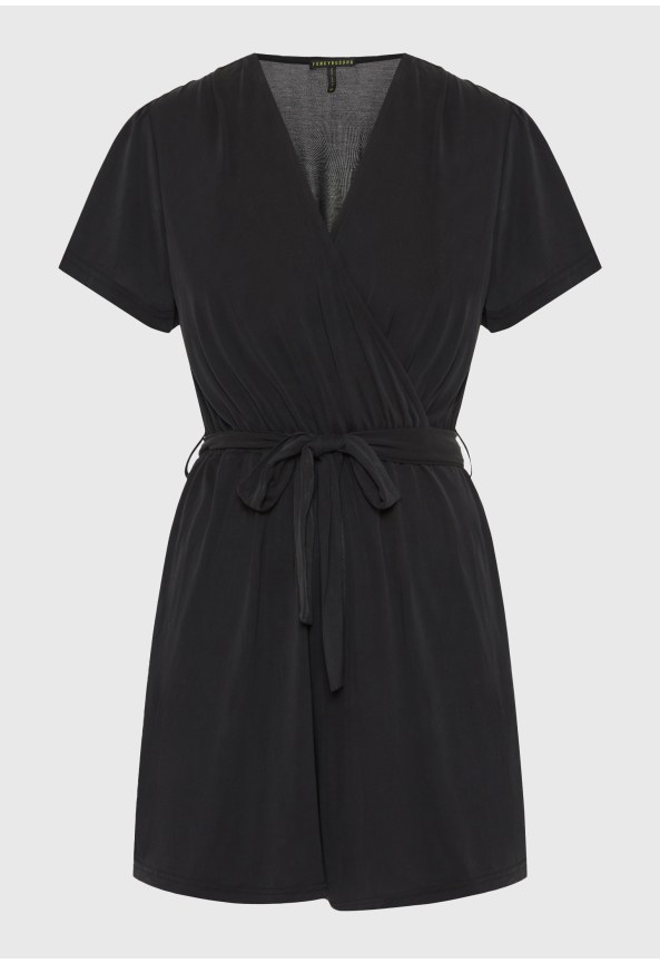 Γυναικεία ολόσωμη φόρμα με ζώνη