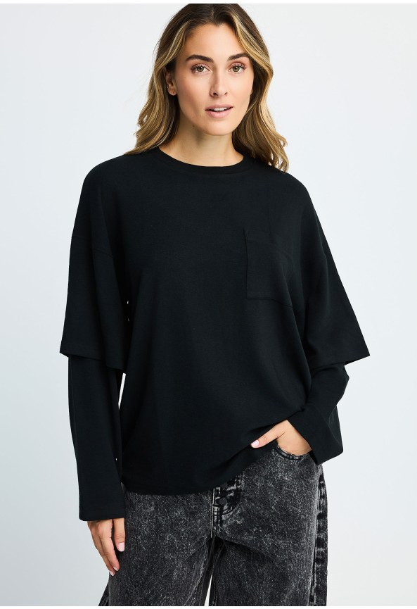 Women's ribbed button-front top with ruffles