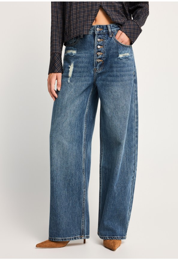 High-waisted distressed baggy jeans with button fly
