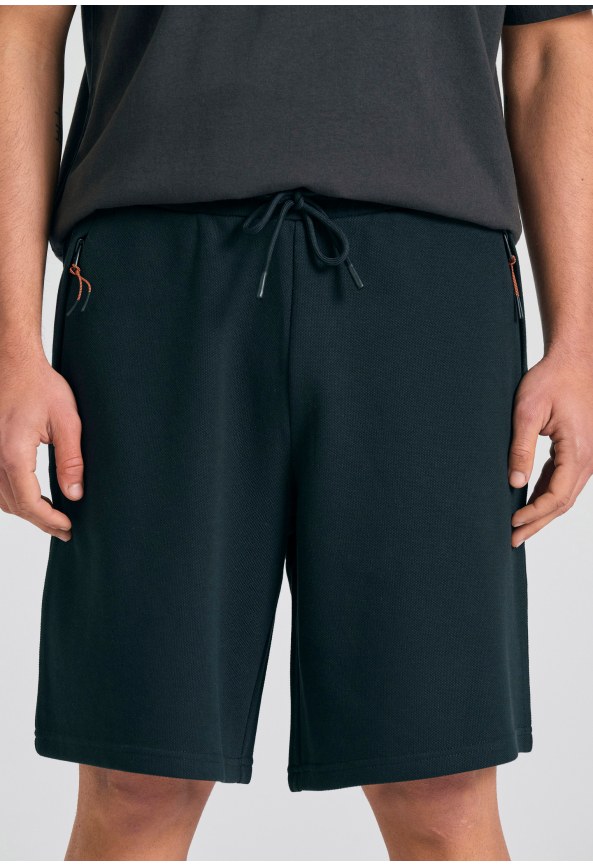 Relaxed fit αθλητική βερμούδα σε πικέ ύφανση