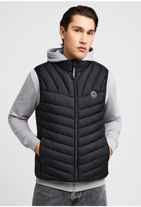 Ανδρικό αμάνικο καπιτονέ μπουφάν.